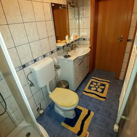 Ina *